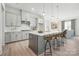 Modern kitchen featuring a large island, stainless steel appliances, and pendant lighting at 5301 Mint Harbor Way # 0315, Charlotte, NC 28269