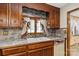 Classic kitchen with wooden cabinets, vintage appliances, and unique countertops at 5643 Twinkle Dr, Concord, NC 28025
