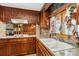 Classic kitchen featuring wooden cabinets and vintage accents at 5643 Twinkle Dr, Concord, NC 28025
