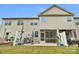 Spacious backyard featuring a patio, screened in porch, and a well-maintained lawn at 6021 Sweetbay Ln, Indian Land, SC 29707