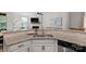 Kitchen with granite countertops, stainless steel sink and appliances, and bright white cabinets at 6021 Sweetbay Ln, Indian Land, SC 29707