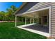 Spacious covered patio area with view of lush green backyard at 6026 Gray Shadow Ct, York, SC 29745
