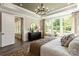 Bright main bedroom featuring natural light, stylish decor, and connecting door at 6026 Gray Shadow Ct, York, SC 29745