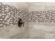 A close-up of the tile shower showcasing the shower control and decorative mosaic tile work at 6026 Gray Shadow Ct, York, SC 29745