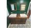 Elegant bathroom featuring double vanity and ornate tile flooring at 603 E Main St, Rock Hill, SC 29730