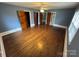 Spacious bedroom featuring hardwood floors and multiple closets for ample storage at 603 E Main St, Rock Hill, SC 29730