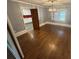 Dining room features hardwood floors and modern lighting at 603 E Main St, Rock Hill, SC 29730