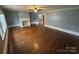 Bright living room with hardwood floors and classic fireplace at 603 E Main St, Rock Hill, SC 29730