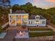 Lakefront home with multiple outdoor entertaining areas at 8150 Malibu Pointe Ln, Denver, NC 28037