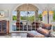 Beautiful view of a covered porch and the lake beyond at 8150 Malibu Pointe Ln, Denver, NC 28037