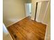 Bedroom boasts gleaming hardwood floors and closet at 837 Corwin Dr, Charlotte, NC 28213
