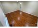Bedroom features hardwood floors and ample natural light at 837 Corwin Dr, Charlotte, NC 28213