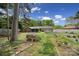 Expansive backyard featuring a garden bed and mature trees, perfect for outdoor activities at 8509 Anette Ave, Mint Hill, NC 28227