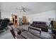 Comfortable living room with plush seating, neutral decor, and access to adjacent rooms at 8509 Anette Ave, Mint Hill, NC 28227