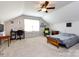 Spacious bedroom featuring a ceiling fan and a large window at 864 Ledgestone Ct, Fort Mill, SC 29708
