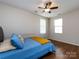 Bedroom featuring a ceiling fan, and large windows for plenty of natural light at 864 Ledgestone Ct, Fort Mill, SC 29708