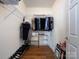 Walk-in closet featuring wire shelving and wood flooring at 864 Ledgestone Ct, Fort Mill, SC 29708