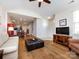 Open-concept living room with hardwood floors and a vaulted ceiling at 864 Ledgestone Ct, Fort Mill, SC 29708