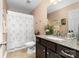 Clean bathroom with a granite countertop, vanity, and neutral finishes at 9624 Buckskin Ln, Mint Hill, NC 28227
