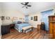 Large main bedroom features wood floors, natural light and ample space at 9624 Buckskin Ln, Mint Hill, NC 28227