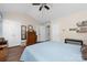 Bedroom featuring wood floors, large closets, and a cozy atmosphere at 9624 Buckskin Ln, Mint Hill, NC 28227