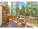 Cozy deck features a table and chairs, perfect for outdoor relaxation at 9624 Buckskin Ln, Mint Hill, NC 28227