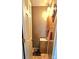 Small bathroom featuring a single sink vanity, storage cabinet and decorative wall art at 112 Trestle Cir, New London, NC 28127