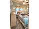 Cozy bedroom with natural light, butterfly accents, and a mirrored wardrobe at 112 Trestle Cir, New London, NC 28127