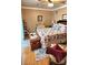 Charming bedroom with natural light, hardwood floors, and comfortable bedding at 112 Trestle Cir, New London, NC 28127
