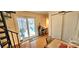 Bright dining area offering access to the patio with a home office area at 112 Trestle Cir, New London, NC 28127