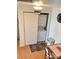 Interior laundry closet features a stacked washer and dryer for convenience at 112 Trestle Cir, New London, NC 28127
