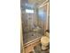 Shower with tile surround, a shower bench, a shower niche, and a glass enclosure at 112 Trestle Cir, New London, NC 28127