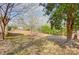 Expansive backyard featuring mature trees, lush greenery, and a natural setting for outdoor enjoyment at 1142 Canterbury Dr, Lancaster, SC 29720