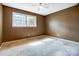 Bedroom with a window letting in natural light and neutral-colored walls at 1142 Canterbury Dr, Lancaster, SC 29720