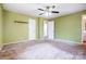 Bedroom featuring a ceiling fan, two windows, and ample space at 1142 Canterbury Dr, Lancaster, SC 29720