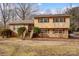 Charming two-story home with a brick and vinyl facade, complemented by well-maintained landscaping at 1142 Canterbury Dr, Lancaster, SC 29720