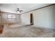 Spacious living room with a window and doorway to another room at 1142 Canterbury Dr, Lancaster, SC 29720