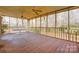 Screened-in patio with a ceiling fan and views of the backyard at 1142 Canterbury Dr, Lancaster, SC 29720