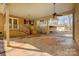 Covered patio with a ceiling fan and access to the backyard at 1142 Canterbury Dr, Lancaster, SC 29720