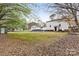 Backyard view of the house including the back porch and above-ground pool at 117 Pine Bluff Dr, Mooresville, NC 28117
