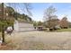 Full house view shows home, with boat storage, driveway and garage at 117 Pine Bluff Dr, Mooresville, NC 28117