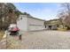 Side view of a spacious 2-car garage and boat storage area offering ample parking and storage at 117 Pine Bluff Dr, Mooresville, NC 28117