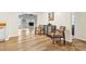 Open living room area offers wood flooring and natural light at 117 Pine Bluff Dr, Mooresville, NC 28117