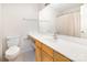 Bright bathroom features a large mirror and vanity with ample countertop space and storage at 1310 Green Oaks Ln # H, Charlotte, NC 28205
