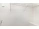 Spacious walk-in closet with multiple storage shelves for optimal organization at 1310 Green Oaks Ln # H, Charlotte, NC 28205