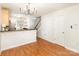 Bright dining area showcasing granite countertops and stainless steel appliances at 1310 Green Oaks Ln # H, Charlotte, NC 28205