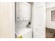 Convenient in-unit laundry closet with stacked washer and dryer; energy guide appliance at 1310 Green Oaks Ln # H, Charlotte, NC 28205