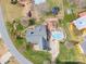 Overhead view of the home featuring a backyard pool, patio, and mature landscaping at 1529 Indian Springs Nw Dr, Conover, NC 28613