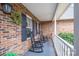 Inviting front porch with rocking chairs, perfect for relaxing and enjoying the outdoors at 1529 Indian Springs Nw Dr, Conover, NC 28613