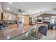 Open-concept kitchen boasts granite counters, stainless appliances, and seamless flow into the adjacent living area at 1529 Indian Springs Nw Dr, Conover, NC 28613